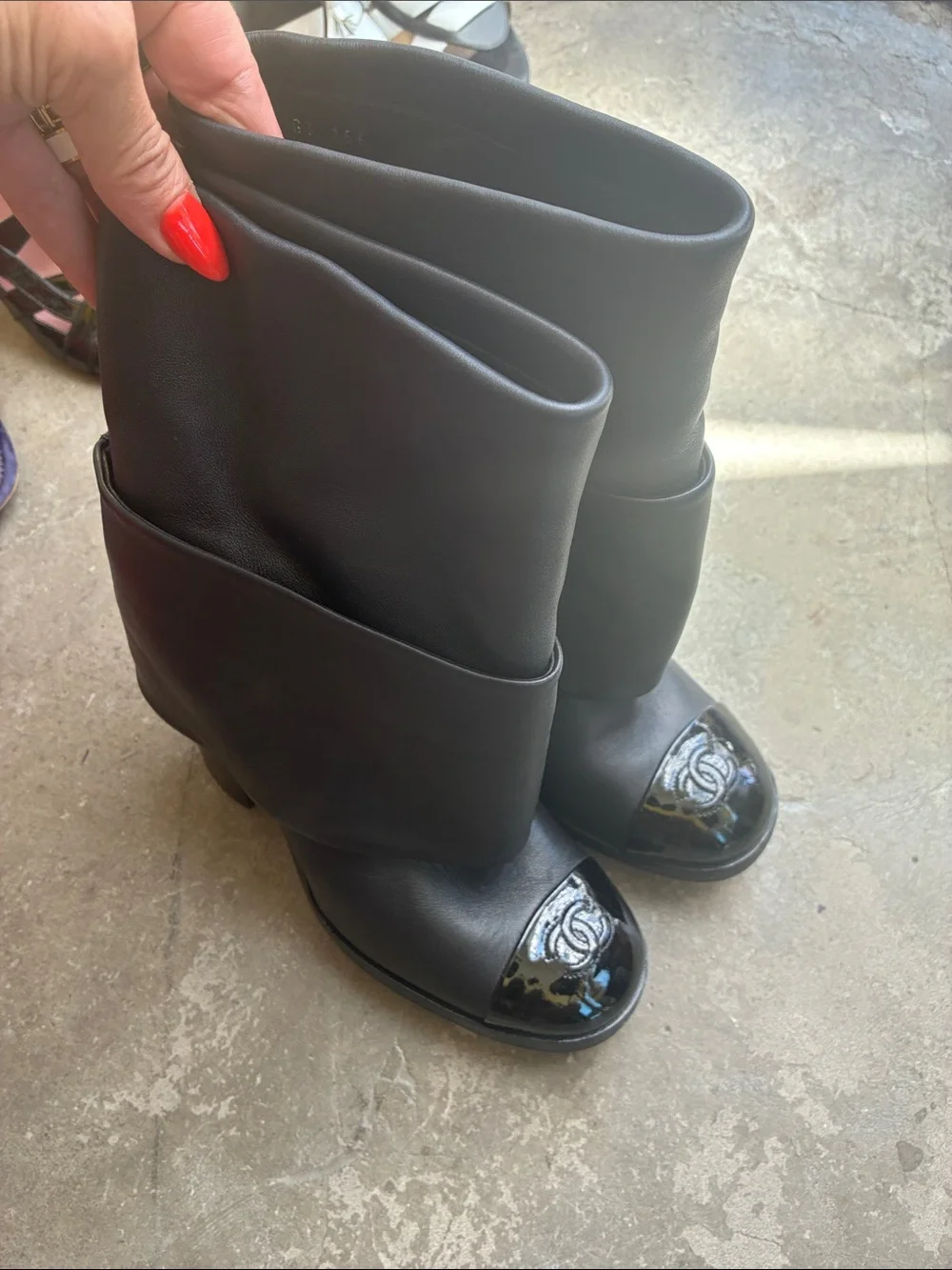 CHANEL Black Leather Fold-Over Mid-Calf Boots with Patent Cap Toe Logo